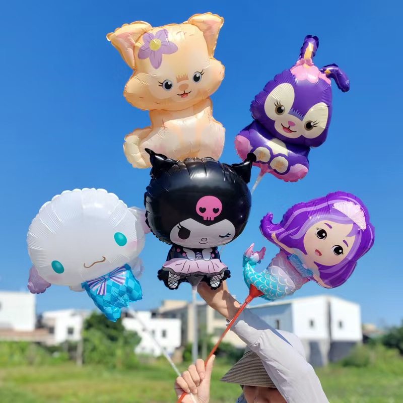 bóng bay giấy bạc nhỏ trên que